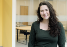 Jordyn Monaghan stands outside a classroom