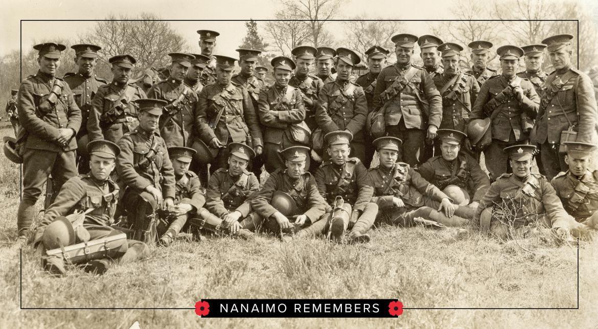 A group of soldiers poses for a photo