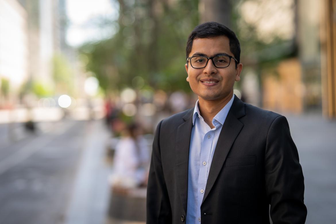 portrait of Sandipan Debnath on a city street