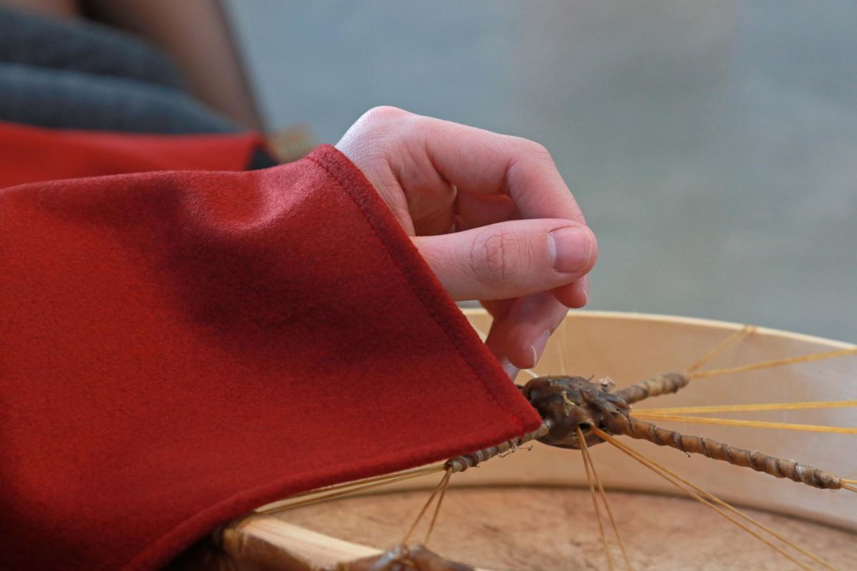 Hand holding a drum